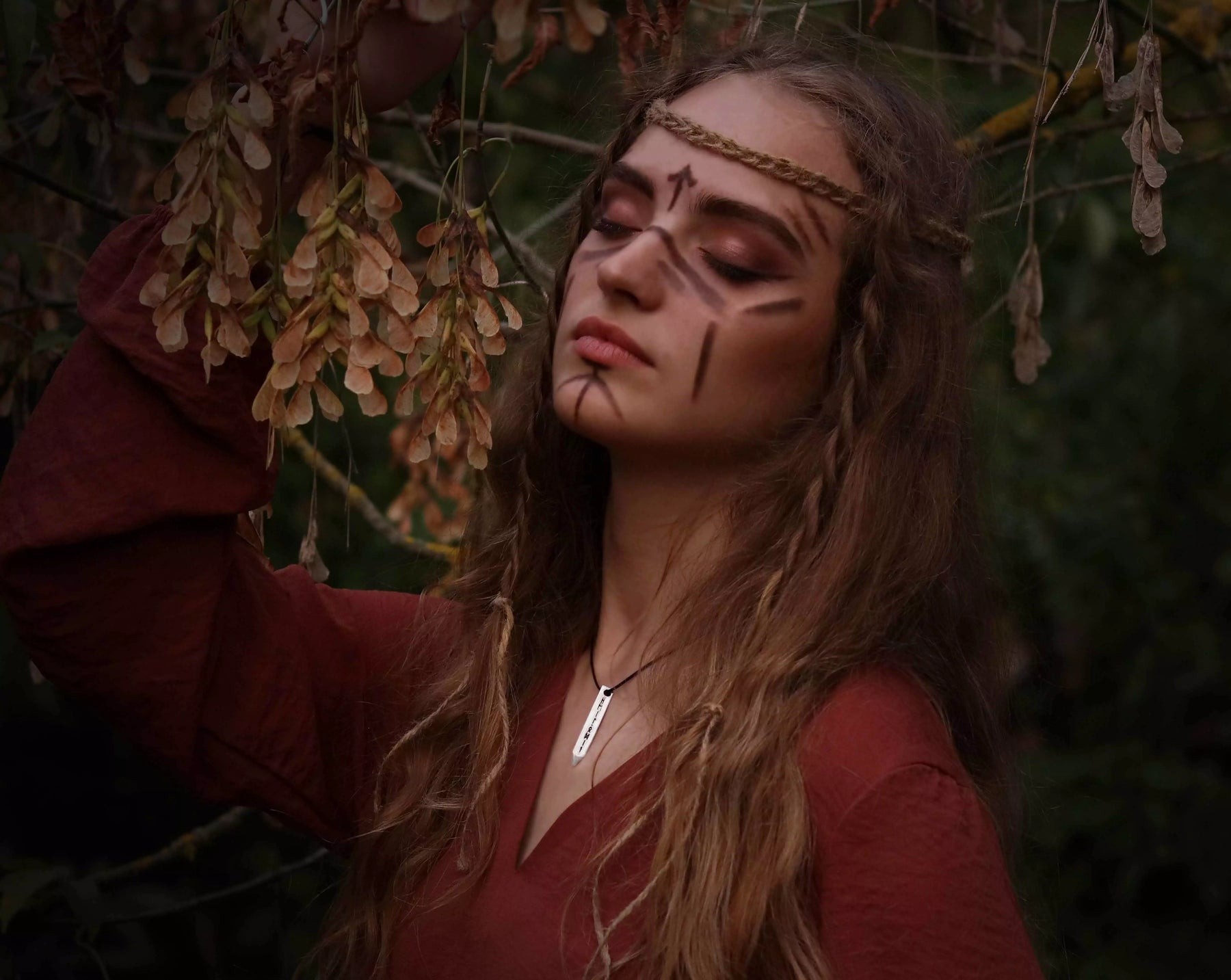 Rune necklace worn on model