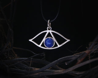 May include: Silver pendant necklace with a blue lapis lazuli stone in the center, shaped like an eye with a triangle inside.