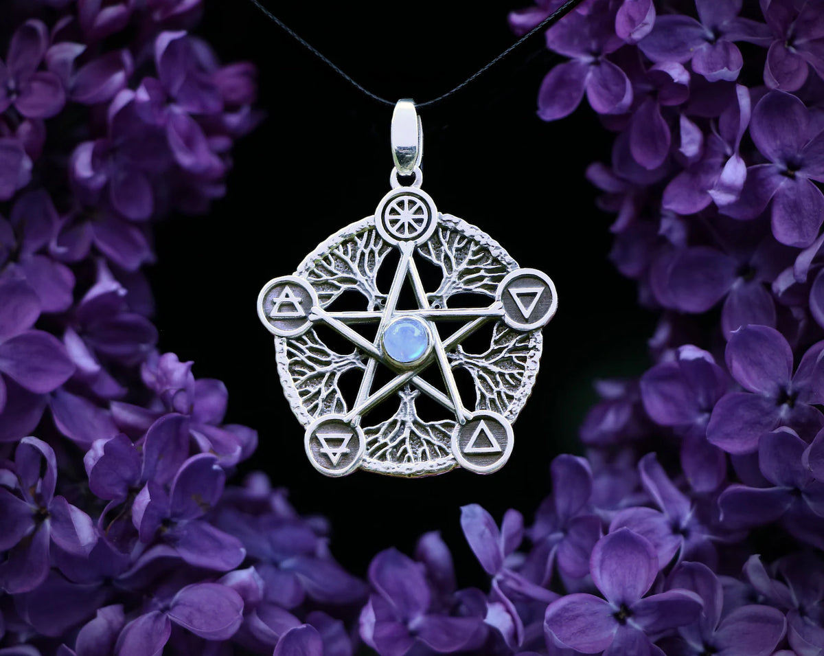 Polished pentagram pendant with a central gemstone