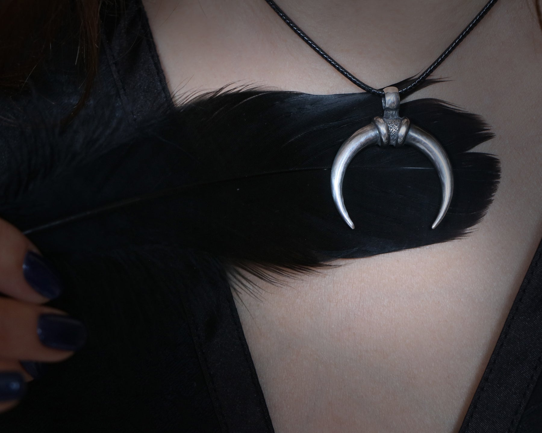 crescent moon pendant made of silver