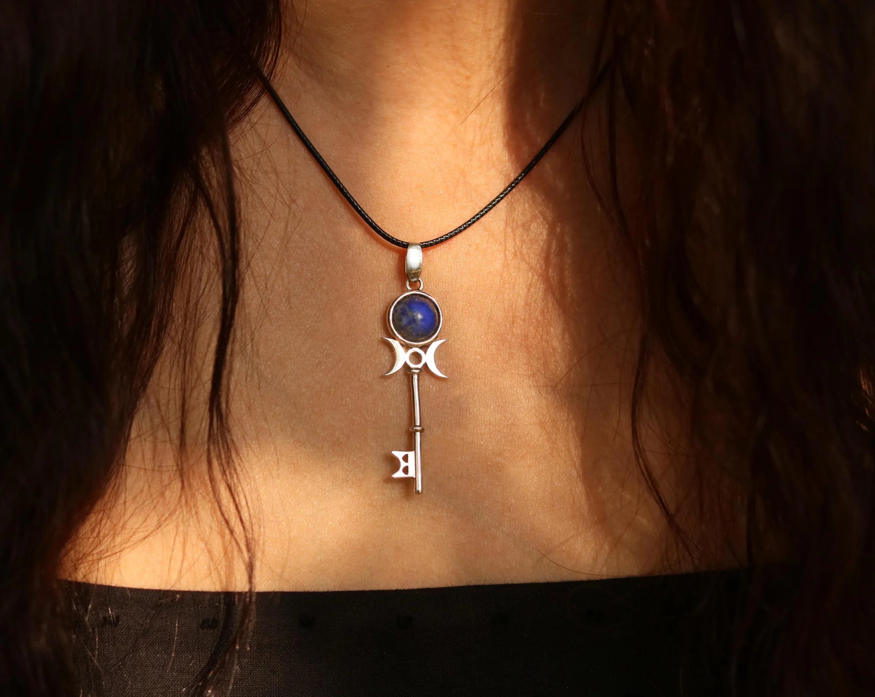 Hecate key necklace worn as symbolic jewelry
