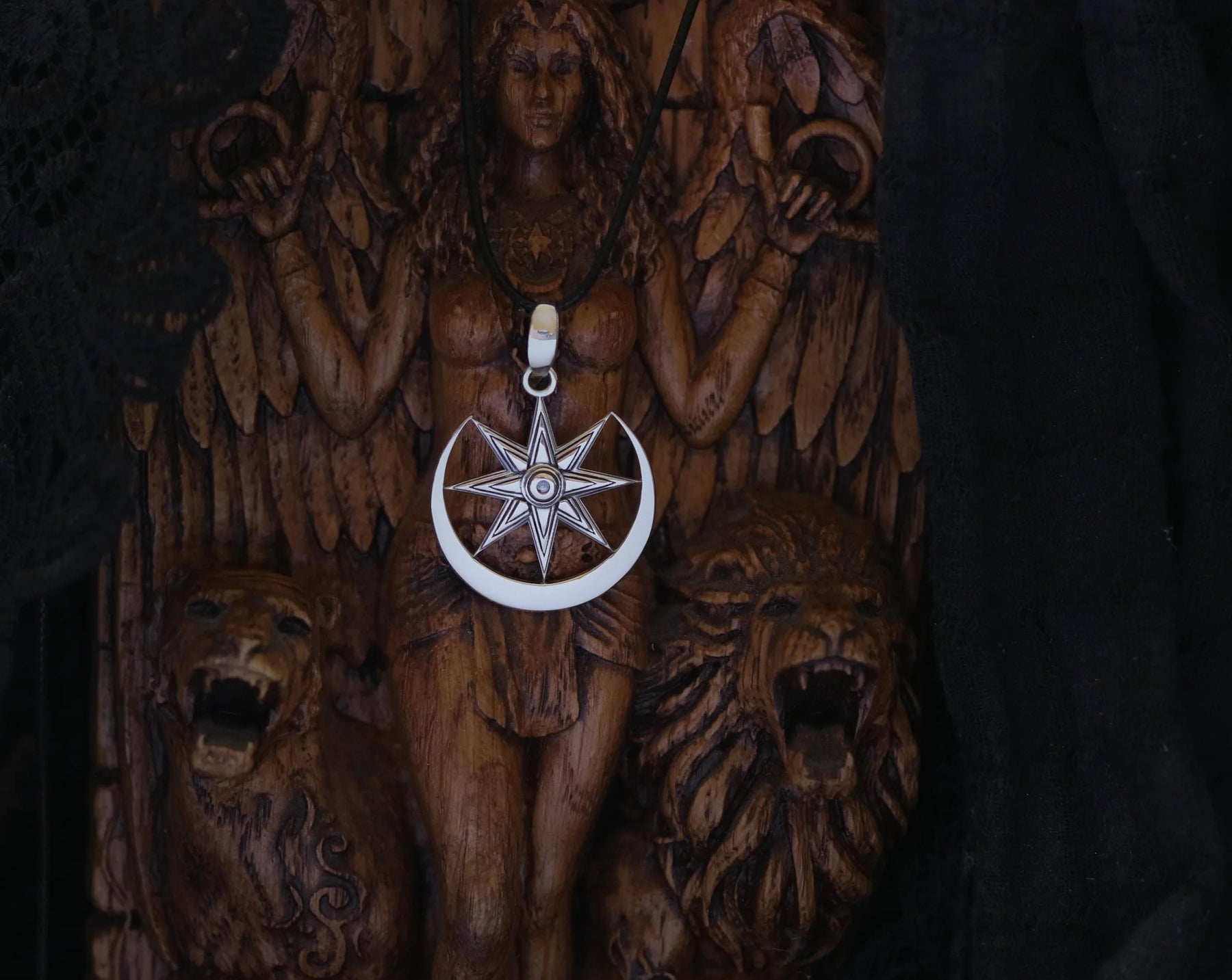 Handcrafted silver Inanna star necklace, close-up