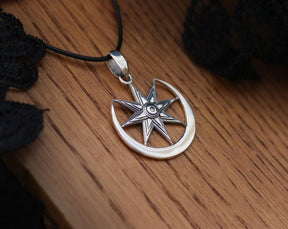 Eight-pointed Ishtar star pendant on black cotton cord