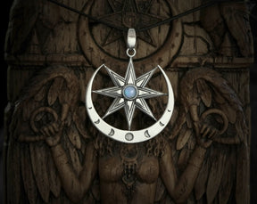 Silver star of Ishtar with a moonstone pendant with on a dark background