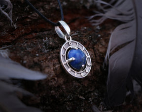 Moon phases pendant made of sterling silver with Lazuli