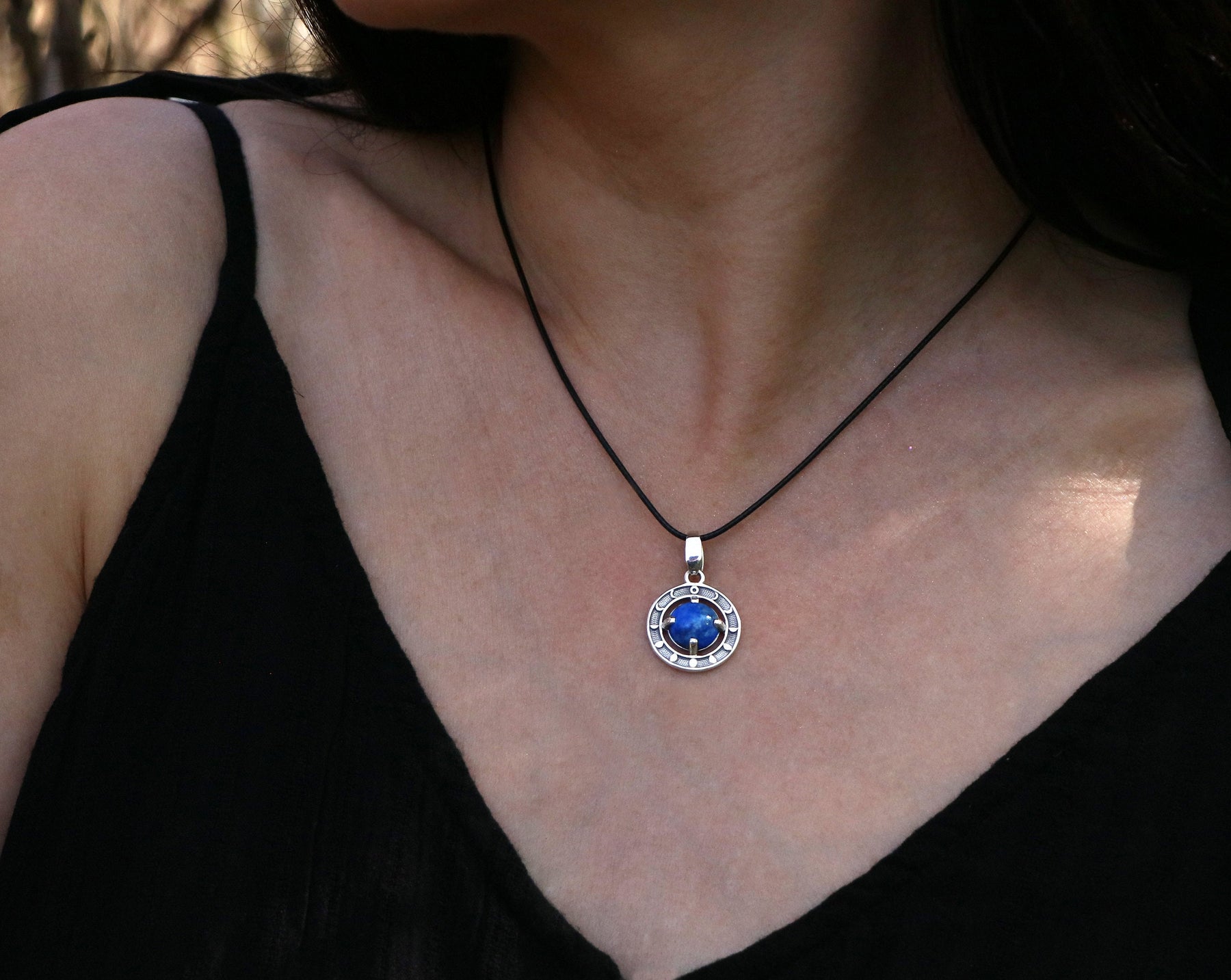 Lapis Lazuli pendant with moon phases made of silver