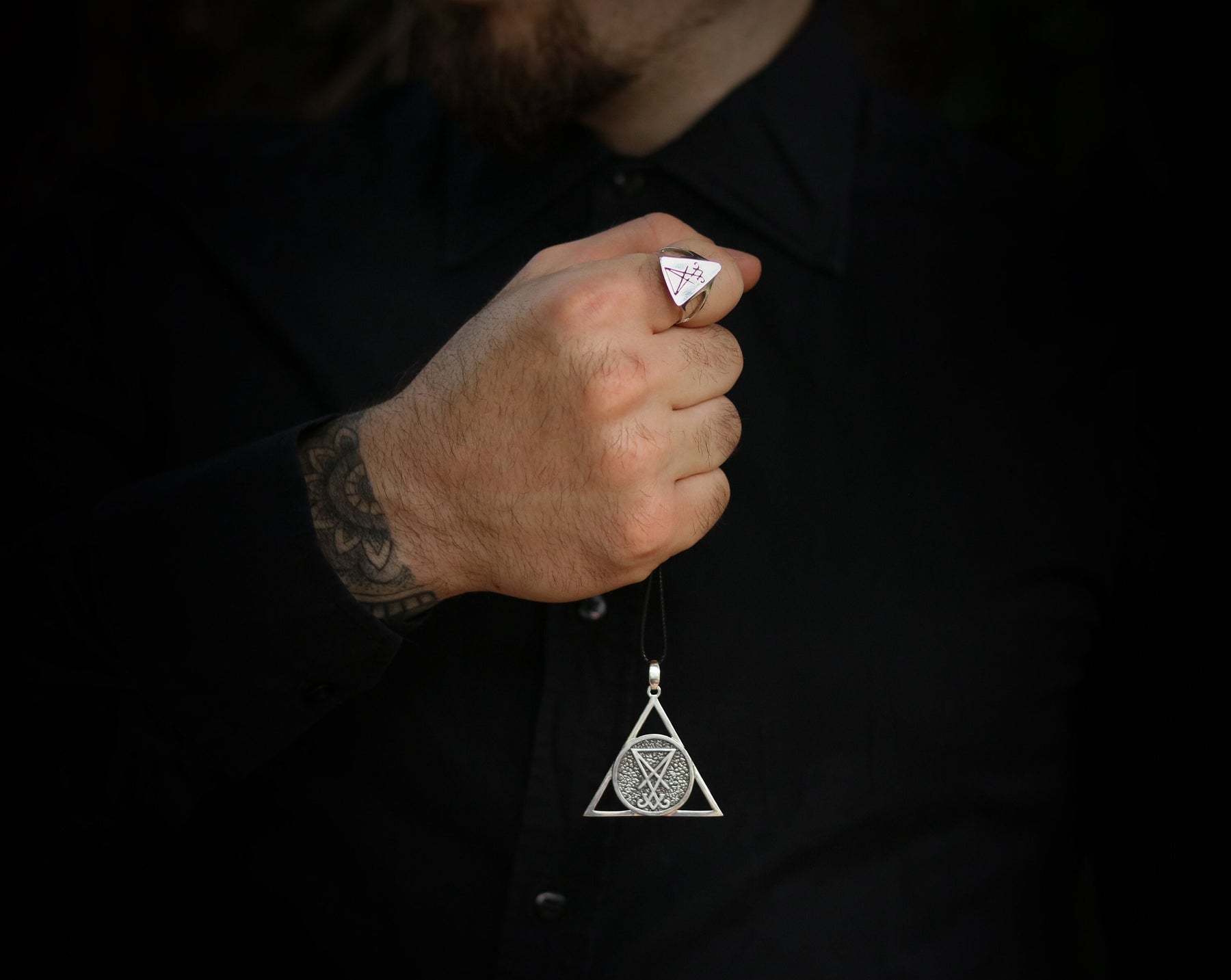 Silver ring and necklace related to Lucifer