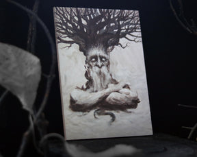 May include: A painting of a tree spirit with a weathered face and a long beard. The spirit is depicted with its arms crossed and a tree trunk growing out of its head. The painting is done in shades of brown and white.