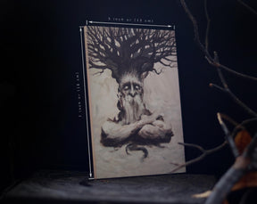 May include: A black and white illustration of a tree spirit with a beard and a large tree growing from its head. The illustration is on a white background and is framed in a wooden frame. The frame is 7 inches by 5 inches.