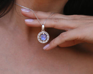 Moonstone moon phases necklace in 925 sterling silver worn with chain