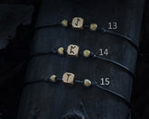 Single-rune bronze bracelet on adjustable cord